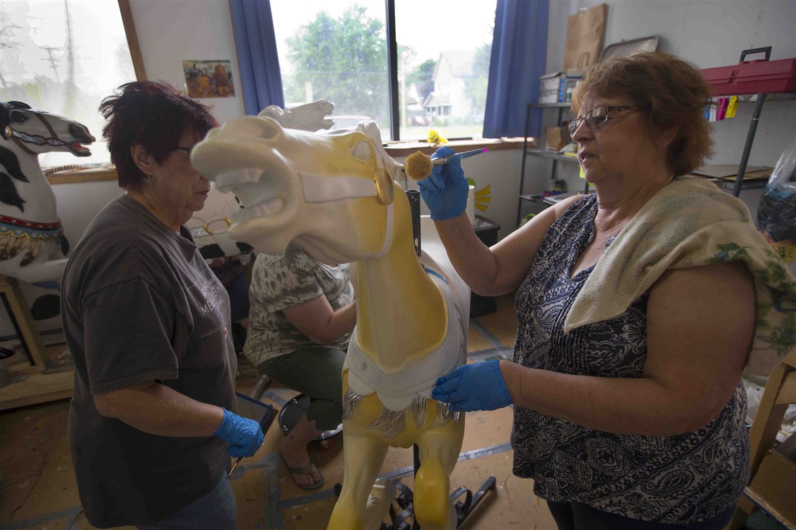 Buffalo Heritage Carousel restoration team's work in progress